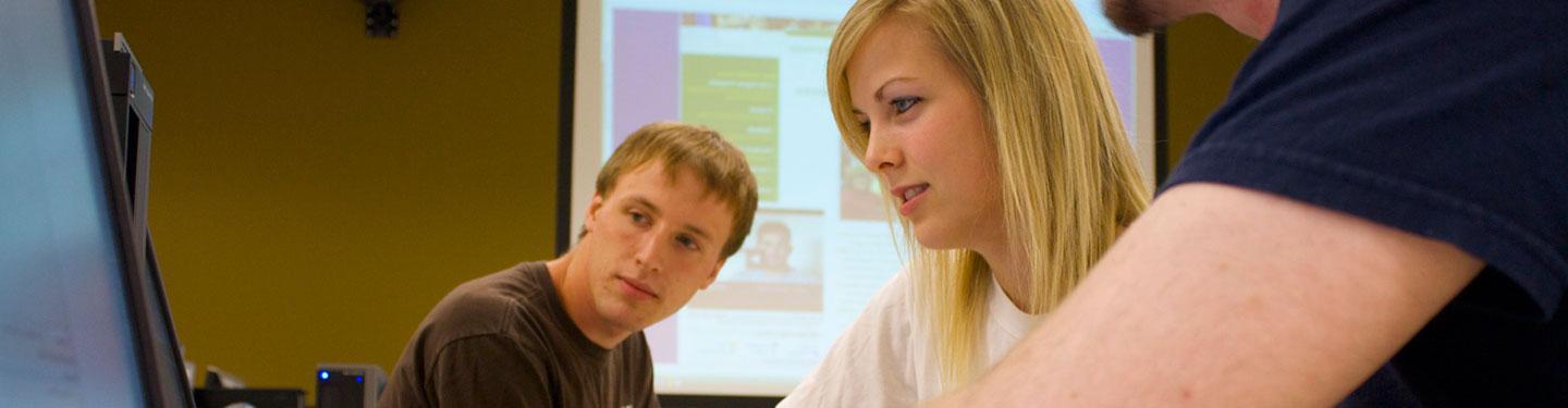 Students working together at a computer